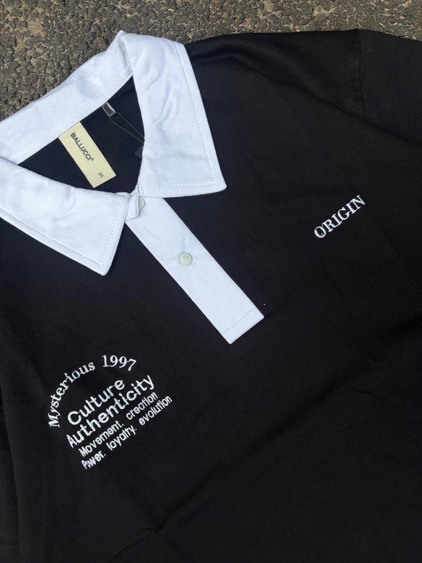 Authenticity black oversized polo tee