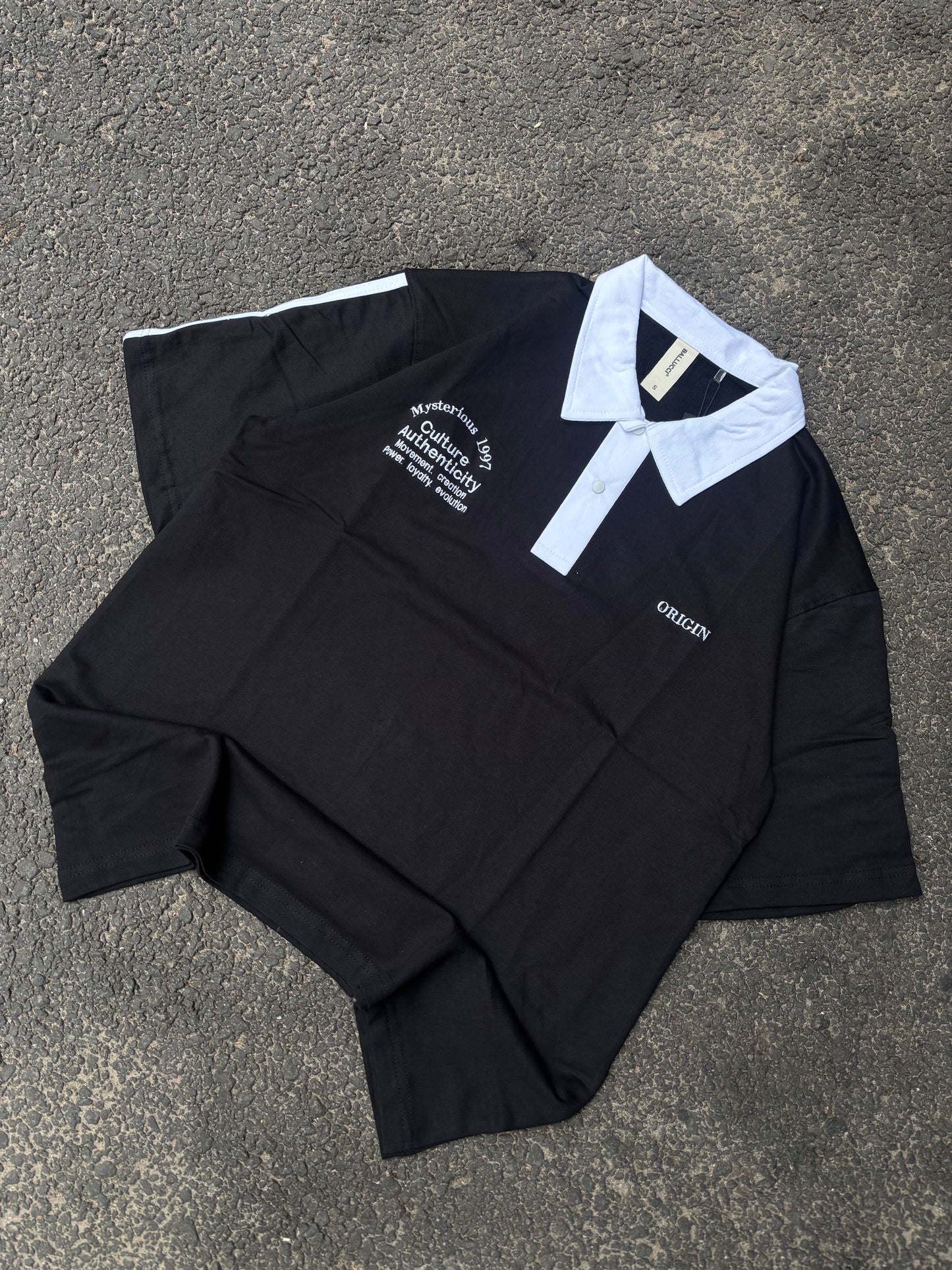 Authenticity black oversized polo tee